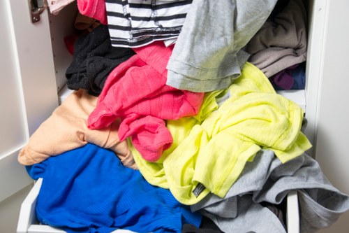 Heavy machinery transporting demolition waste